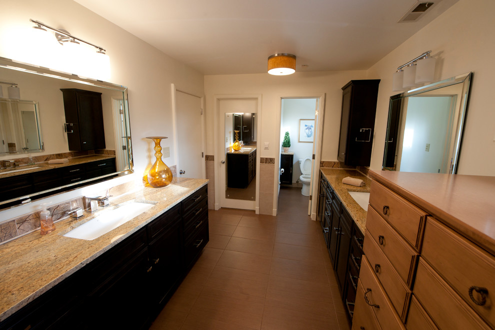 Alcove shower - large transitional master brown tile and ceramic tile ceramic tile alcove shower idea in Indianapolis with an undermount sink, recessed-panel cabinets, black cabinets, granite countertops, a two-piece toilet and beige walls