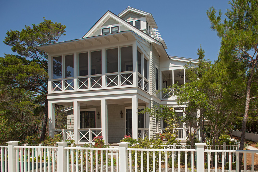 Design ideas for a traditional exterior in Miami with wood siding.