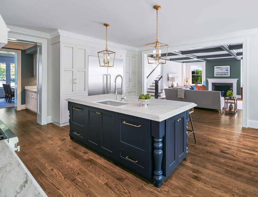 Inspiration for a mid-sized traditional l-shaped open plan kitchen in DC Metro with an undermount sink, quartzite benchtops, stainless steel appliances, dark hardwood floors, with island, brown floor, shaker cabinets and blue cabinets.