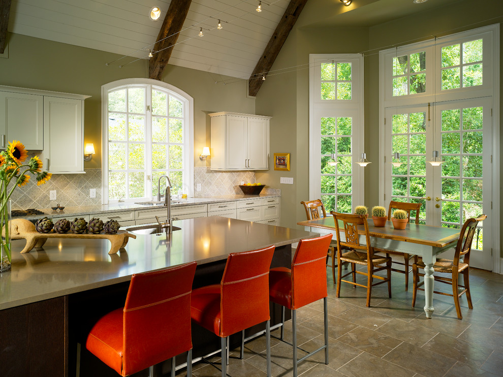 Transitional eat-in kitchen in Atlanta with recessed-panel cabinets, beige cabinets and beige splashback.