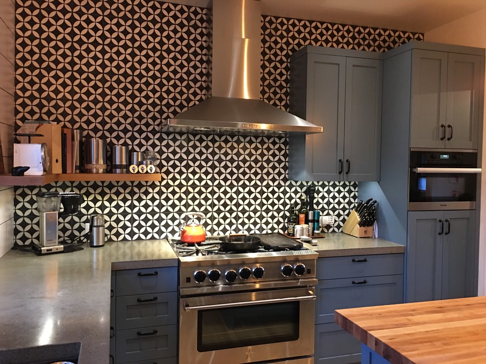 Example of a transitional kitchen design in Seattle