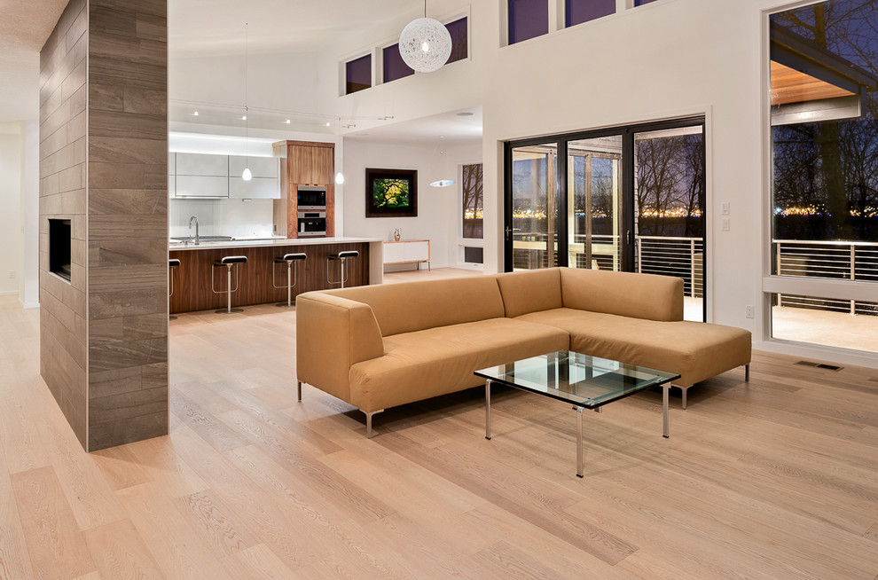 Inspiration for a contemporary formal open concept living room in Portland with white walls and light hardwood floors.