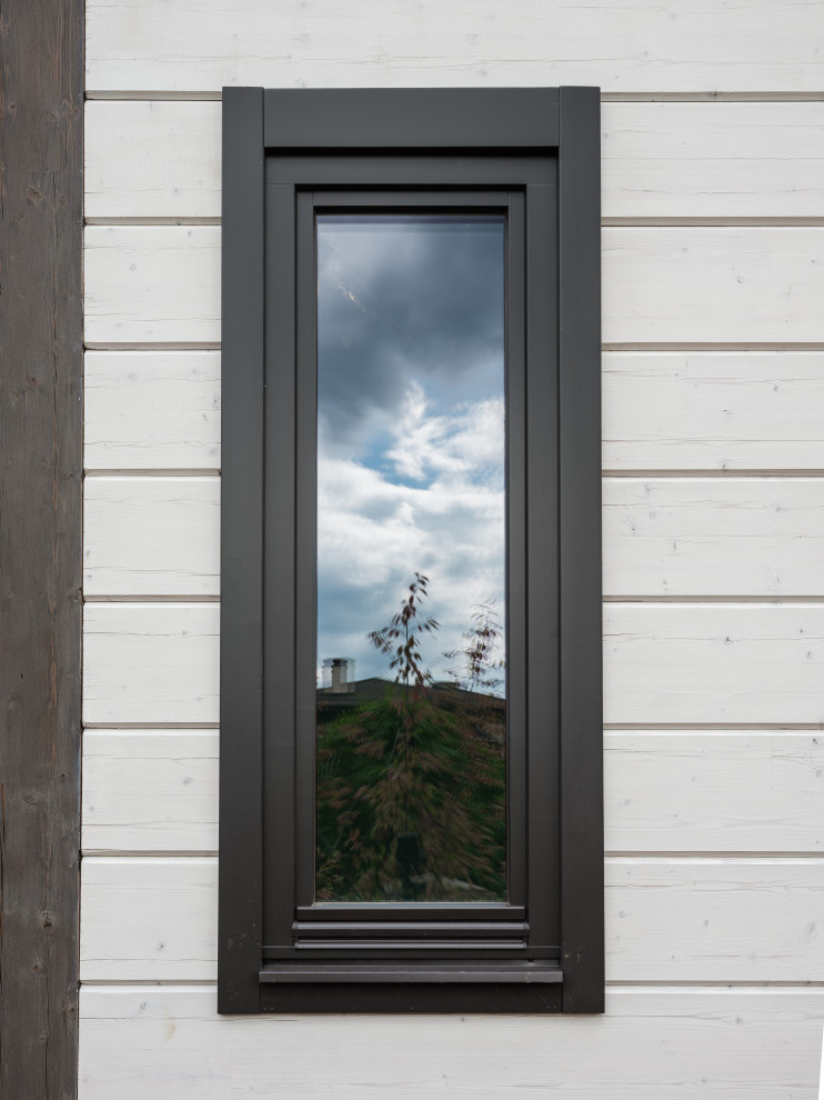 Трапецевидные окна, порталы и входные двери для современного дома