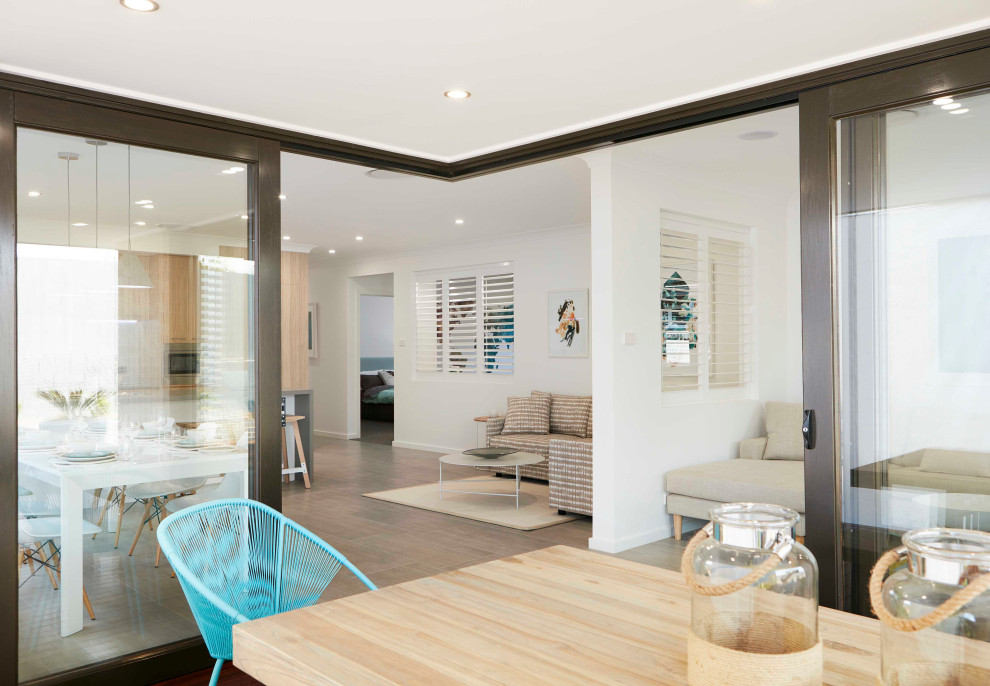 Inspiration for a contemporary backyard patio in Sydney.