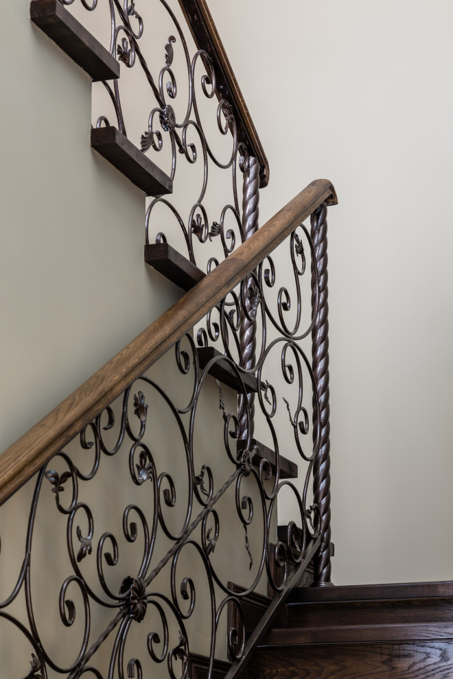 Inspiration for a large cottage wooden straight metal railing staircase remodel in Moscow with wooden risers