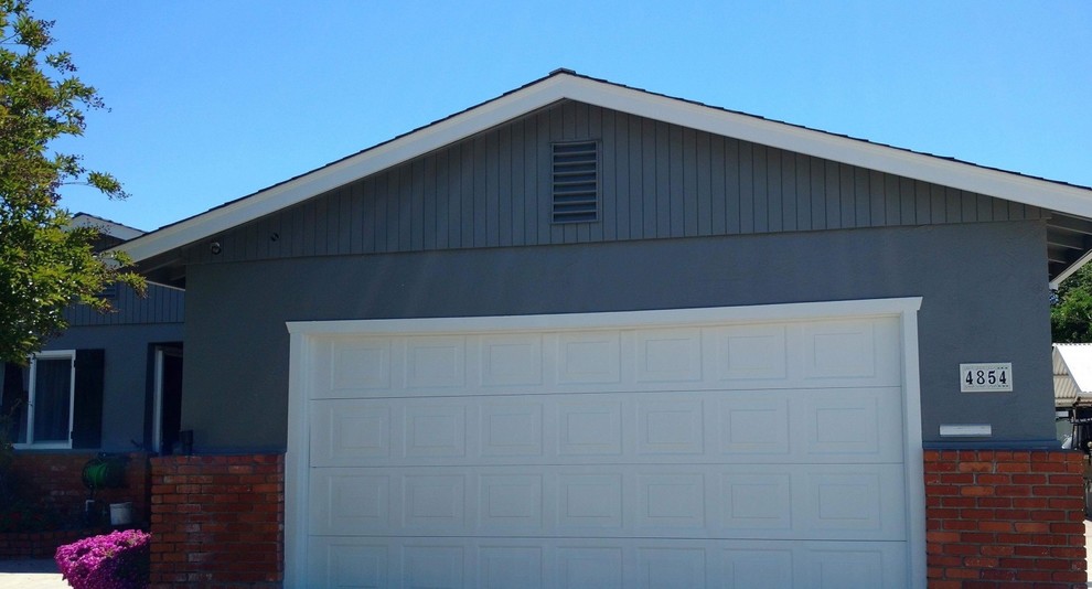 Inspiration for a small transitional blue one-story mixed siding gable roof remodel with a shingle roof