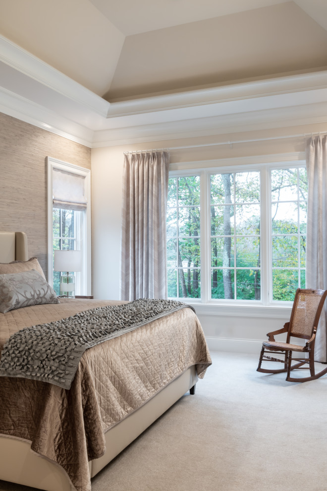 Design ideas for a large master bedroom in St Louis with beige walls, carpet, beige floor, coffered and wallpaper.