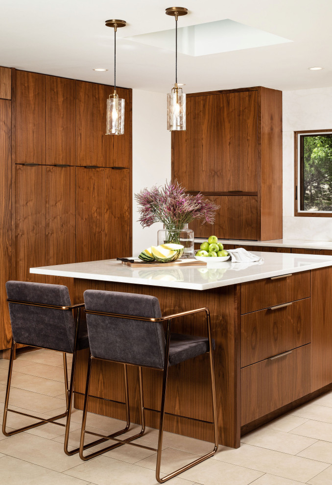 Inspiration for a mid-sized midcentury u-shaped open plan kitchen in Austin with an undermount sink, flat-panel cabinets, medium wood cabinets, quartzite benchtops, white splashback, panelled appliances, porcelain floors, with island, white floor and white benchtop.