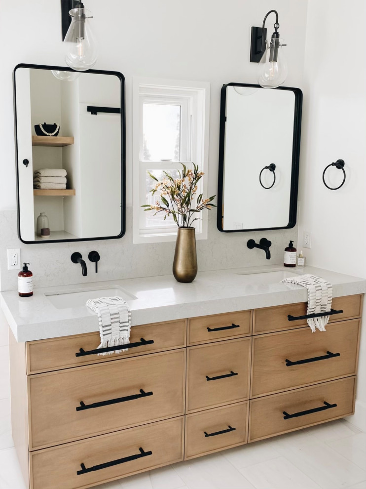 Example of a mid-sized country master white tile marble floor, white floor, double-sink and vaulted ceiling bathroom design in Orange County with shaker cabinets, gray cabinets, a one-piece toilet, white walls, an undermount sink, quartzite countertops, a hinged shower door, gray countertops and a floating vanity