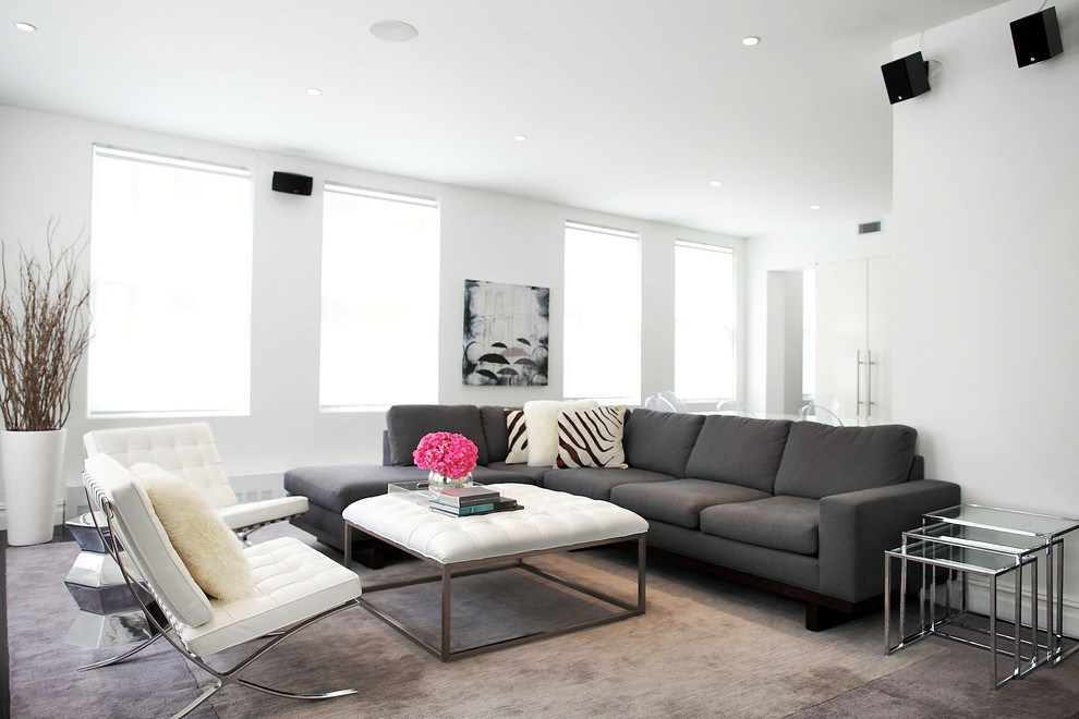 Inspiration for a contemporary living room in New York with white walls.