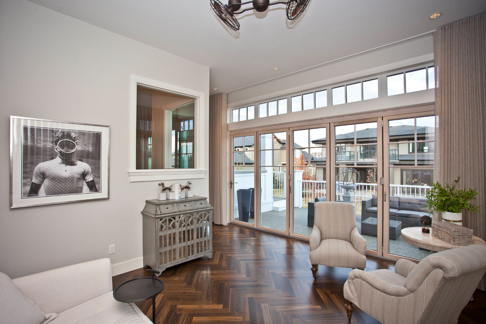 Photo of a traditional sunroom in Calgary with medium hardwood floors and a standard ceiling.