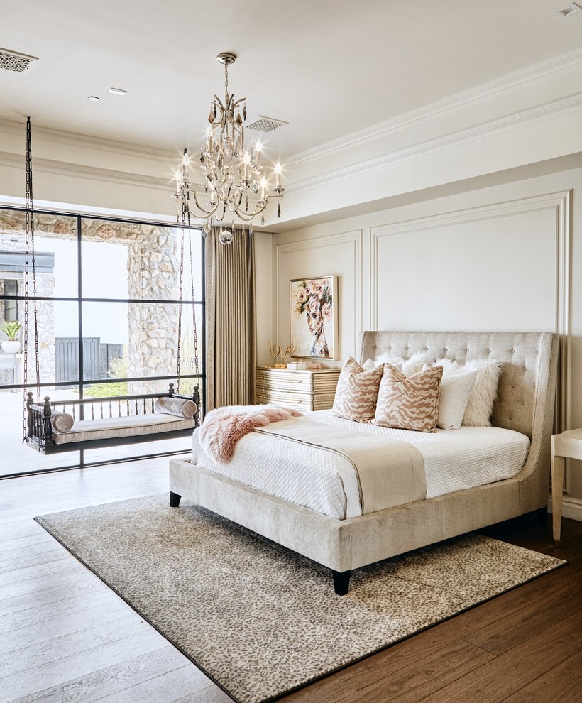 This is an example of a transitional bedroom in Phoenix with beige walls, dark hardwood floors and brown floor.