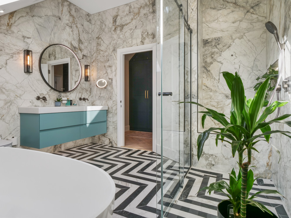 Inspiration for a large eclectic family bathroom in Essex with a freestanding bath, a corner shower, beige tiles, marble tiles, beige walls, ceramic flooring, marble worktops, multi-coloured floors, a sliding door and a single sink.