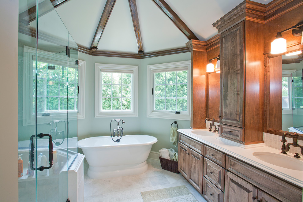 Inspiration for a traditional bathroom in Other with a freestanding tub.