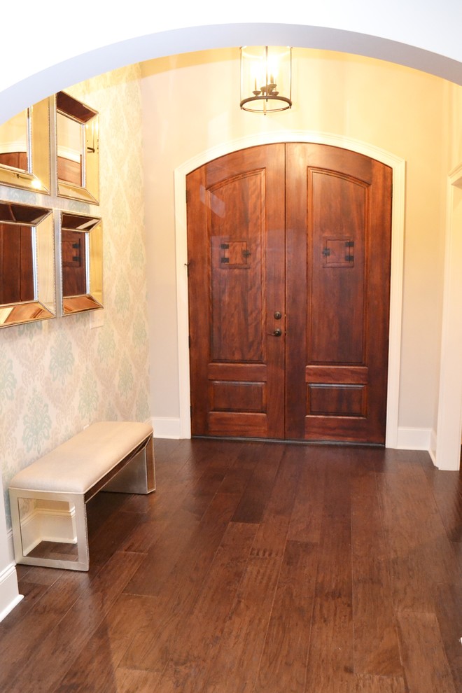Inspiration for a mid-sized transitional ceramic tile and brown floor foyer remodel with blue walls and a brown front door
