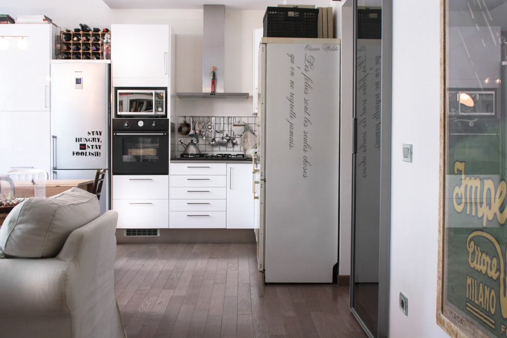 Photo of a contemporary kitchen in Milan.