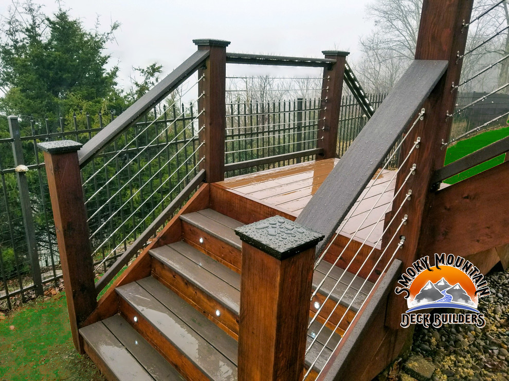 Deck - mid-sized modern backyard deck idea with a pergola