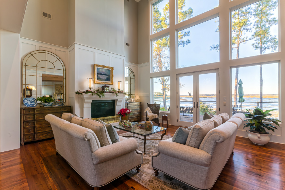 This is an example of a large traditional living room in Atlanta.