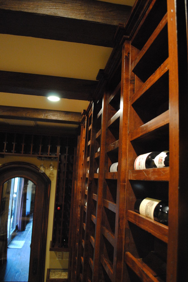 This is an example of a mediterranean wine cellar in Orange County.