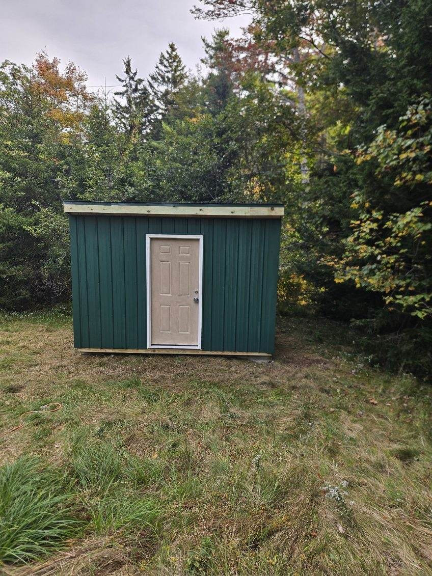 Metal Storage Shed With PT Framing