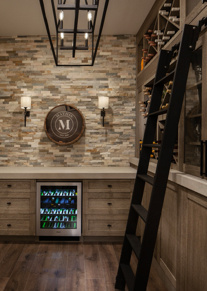 Inspiration for a rustic wine cellar remodel in Denver