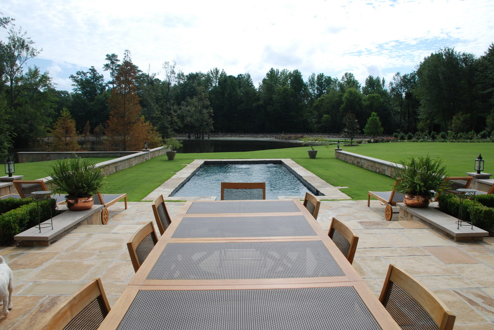 Pool - large backyard stone and rectangular pool idea