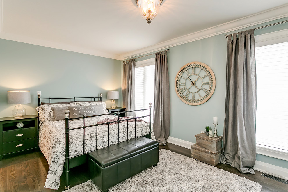 Inspiration for a small transitional master dark wood floor and brown floor bedroom remodel in Toronto with green walls and no fireplace