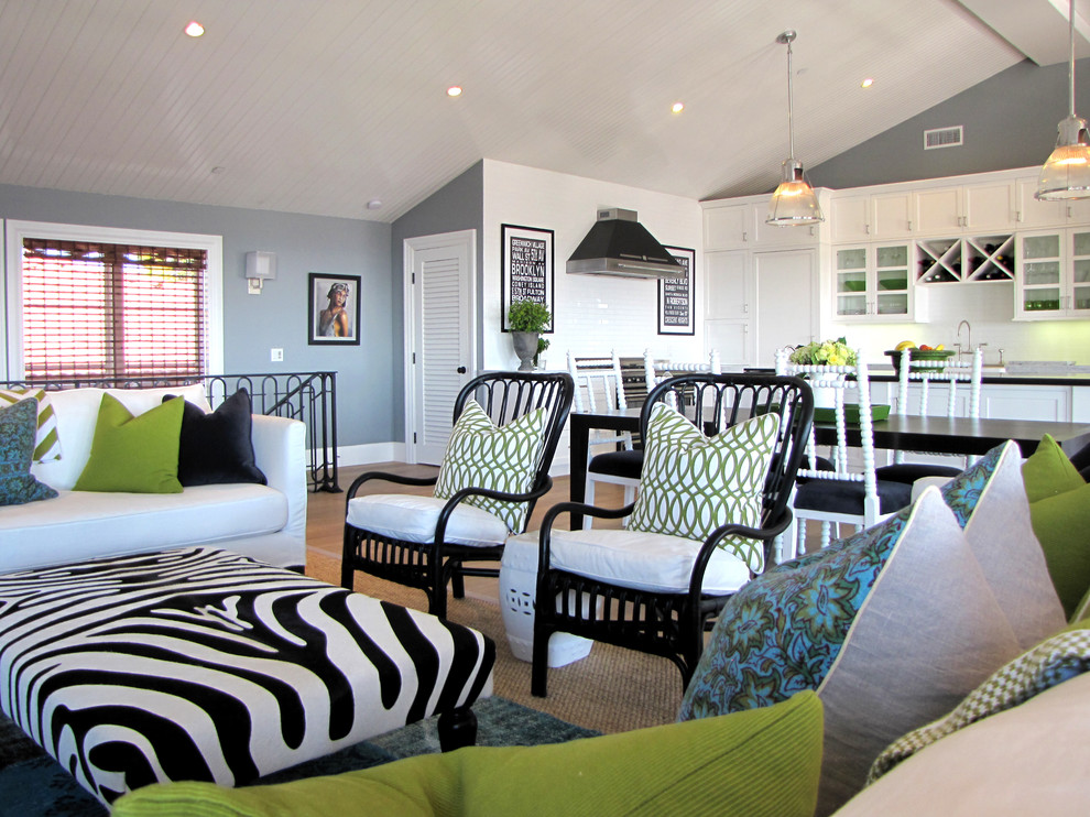 This is an example of a beach style living room in Orange County with grey walls.