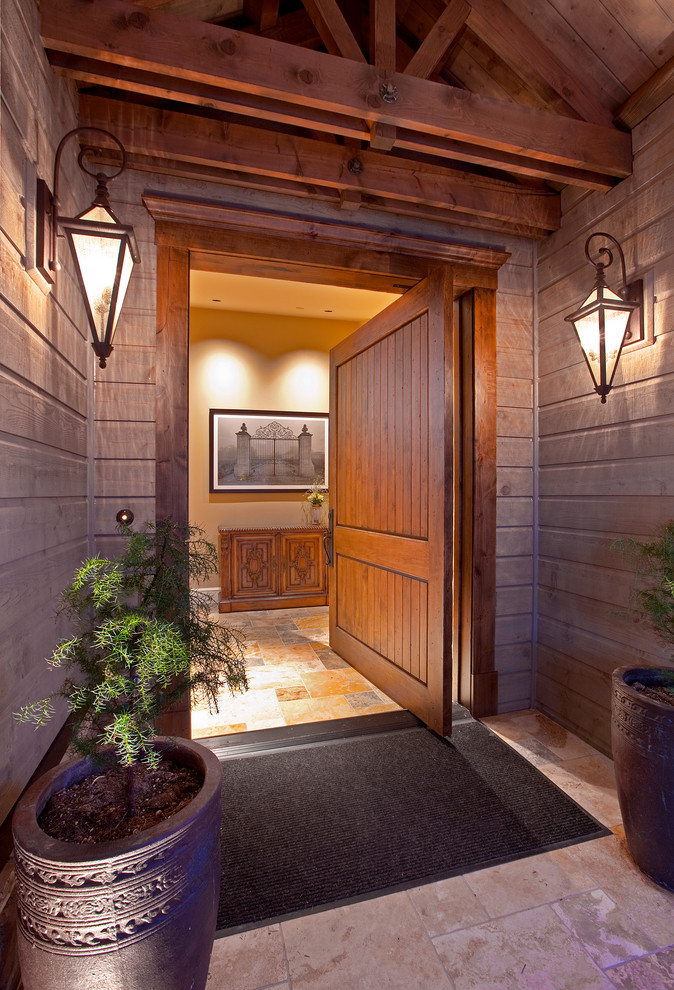 Inspiration for a country front door in Seattle with a pivot front door.