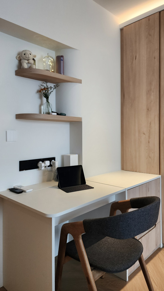 Inspiration for a contemporary home office in Singapore.