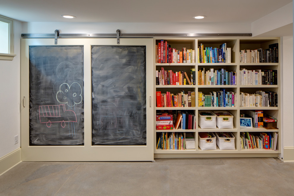 Basement - contemporary concrete floor and gray floor basement idea in Portland with white walls