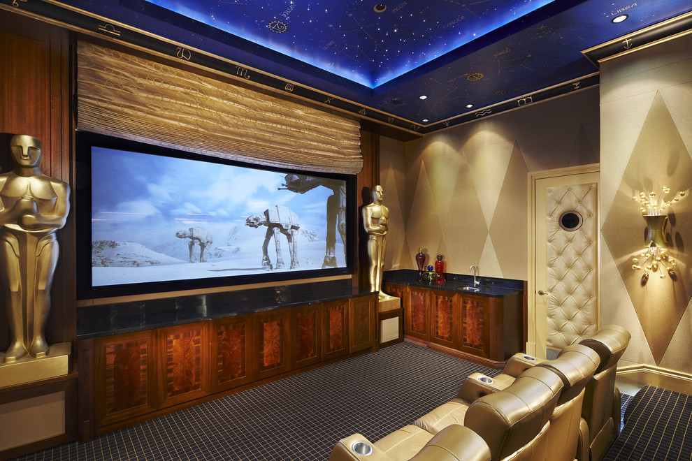 This is an example of a large contemporary enclosed home theatre in Miami with beige walls, carpet and a built-in media wall.