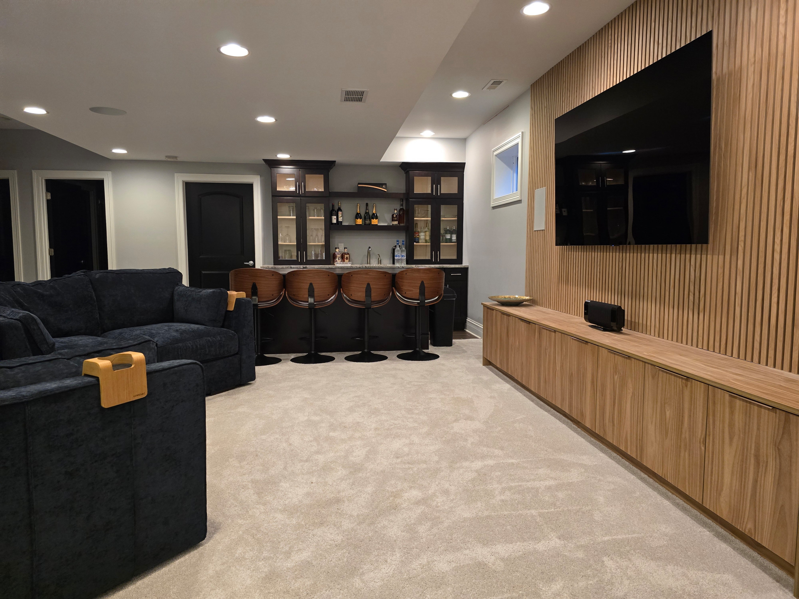 Basement Remodeling with TV Wall and Wet bar