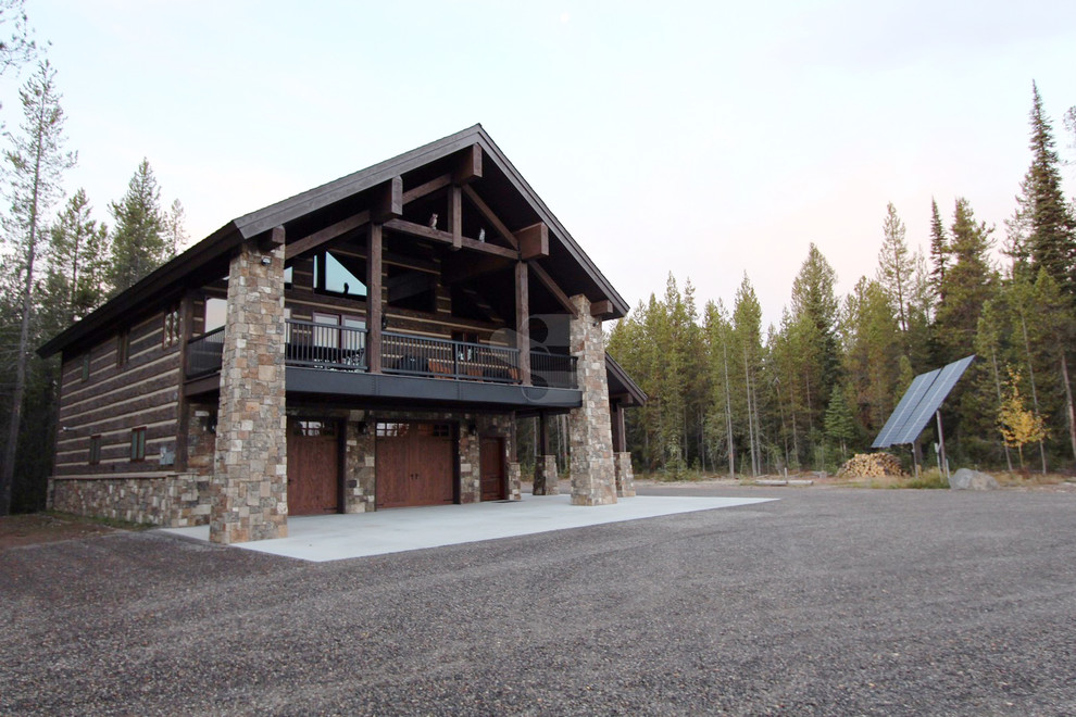 Home design - rustic two-story concrete brown home design idea