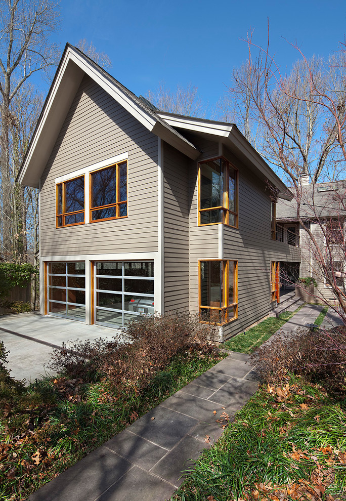 Design ideas for a contemporary brown exterior in Raleigh.