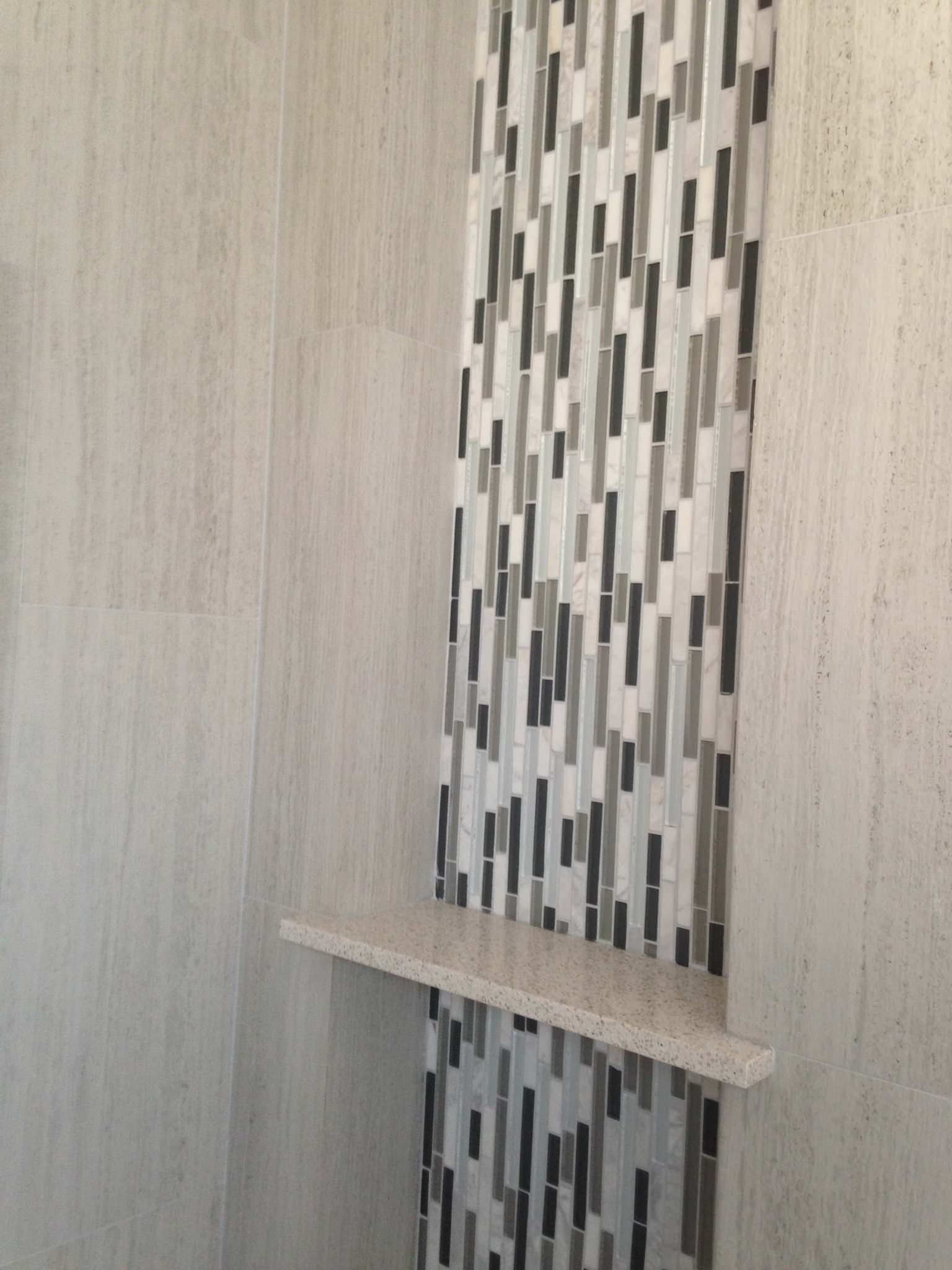 Larger bath shower niche and accent tile