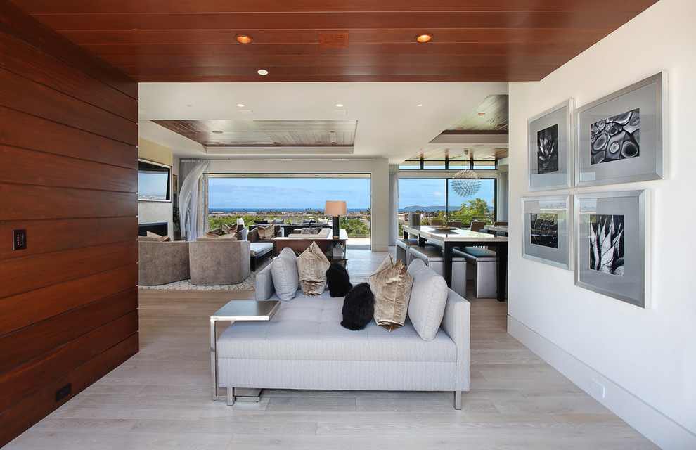 Inspiration for a contemporary living room in Orange County with white walls.