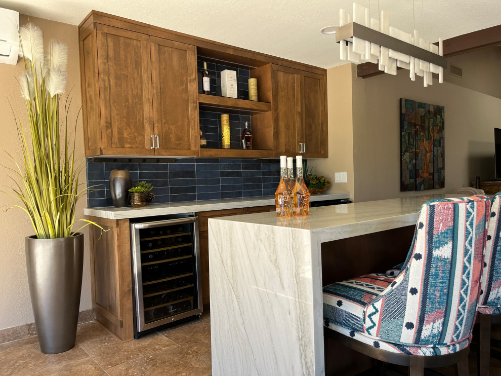 Design ideas for a traditional home bar in Phoenix.