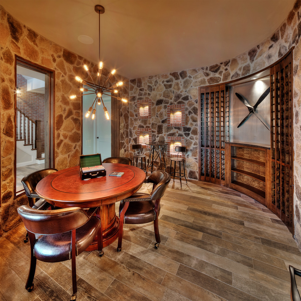 Design ideas for an expansive wine cellar in Kansas City with display racks.