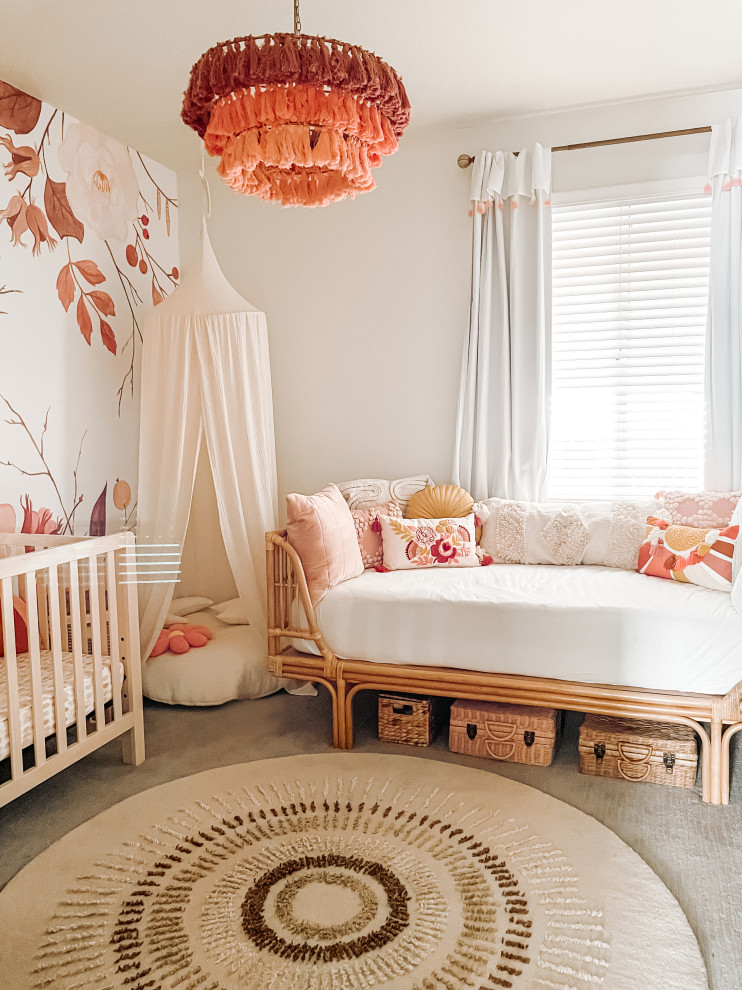 This is an example of a mid-sized contemporary nursery for girls in Other.