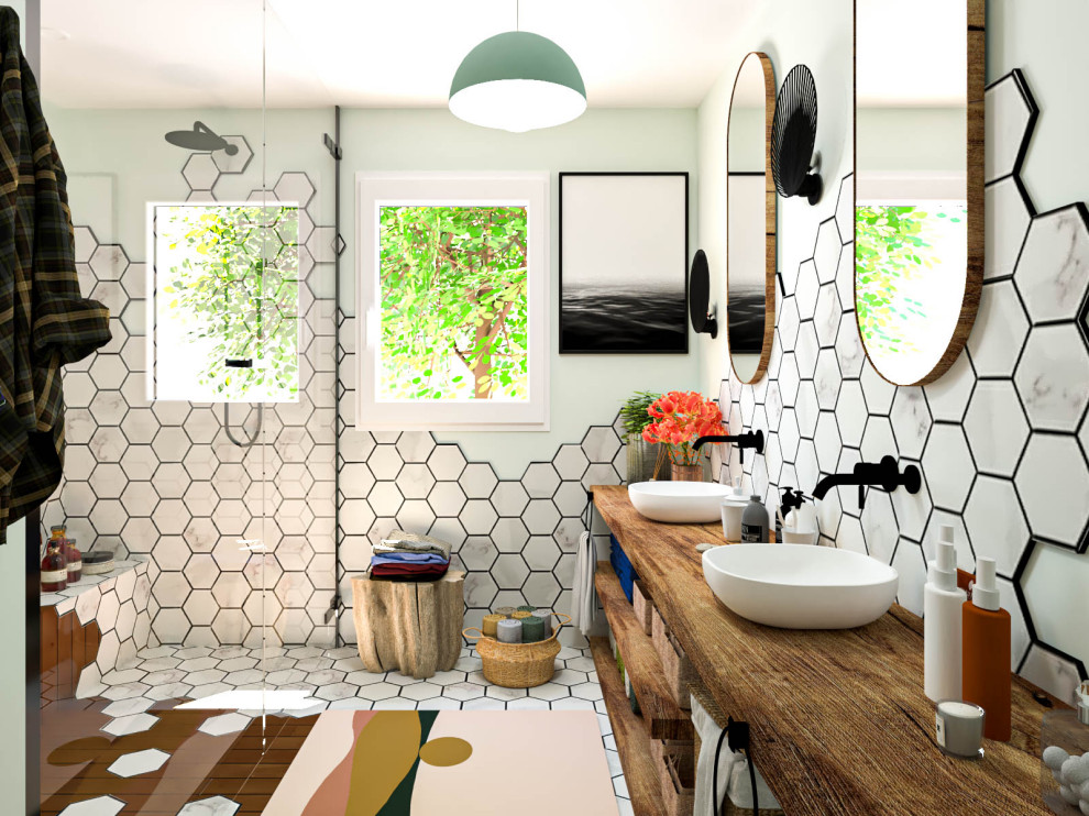 Inspiration for a mid-sized coastal 3/4 white tile wood-look tile floor, brown floor and double-sink bathroom remodel in Toulouse with open cabinets, brown cabinets, a two-piece toilet, green walls, a drop-in sink, wood countertops, brown countertops and a freestanding vanity