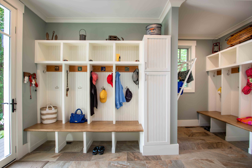 Inspiration for a large mudroom in Other with grey walls, porcelain floors and multi-coloured floor.