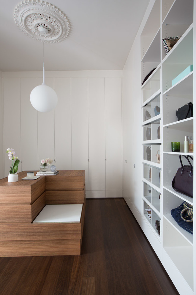 Contemporary women's storage and wardrobe in Adelaide with flat-panel cabinets, white cabinets, dark hardwood floors and brown floor.