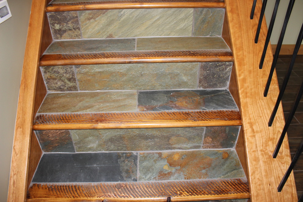 Staircase - rustic staircase idea in Calgary