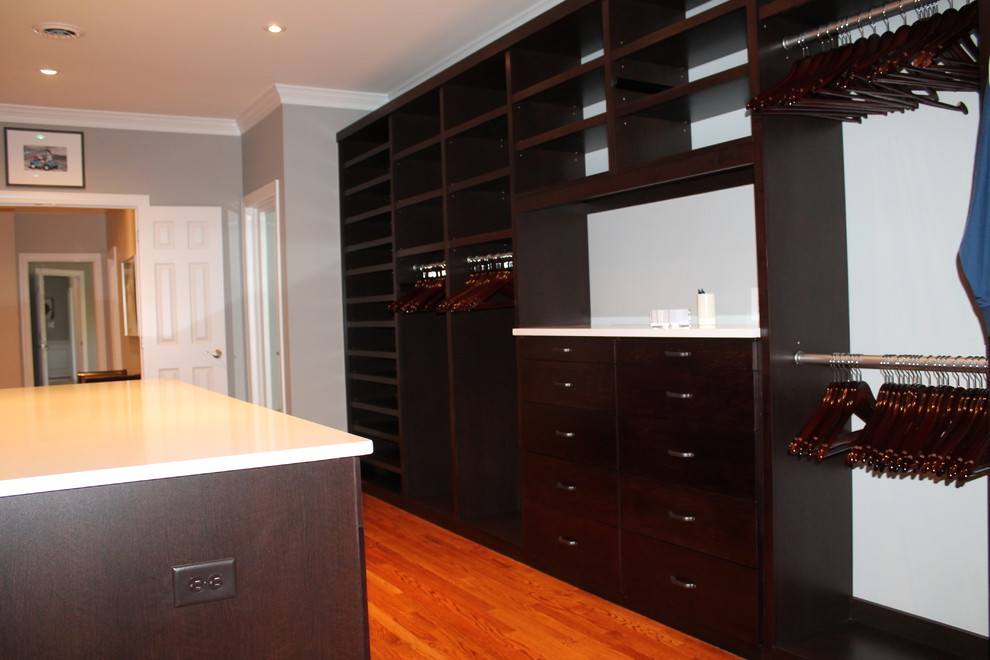 This is an example of a transitional storage and wardrobe in Richmond.