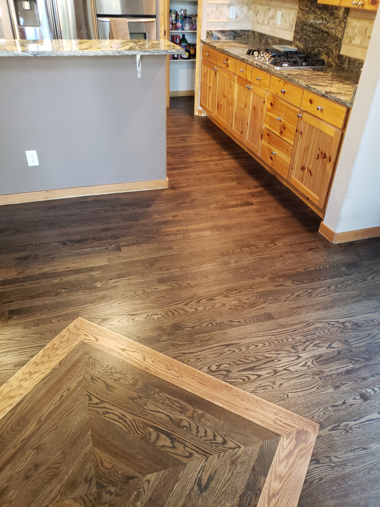 Hardwood Elegance with Custom Inlays & Entry Border