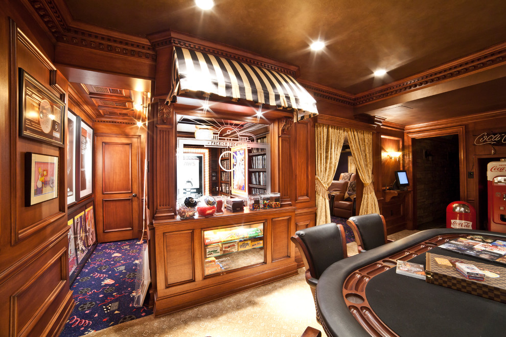 Photo of a large traditional enclosed home theatre in New York with brown walls, carpet and a built-in media wall.