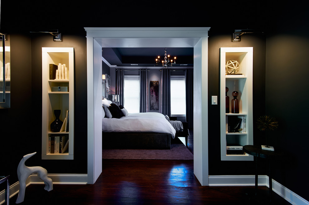 Mid-sized transitional master bedroom in Charlotte with black walls and dark hardwood floors.