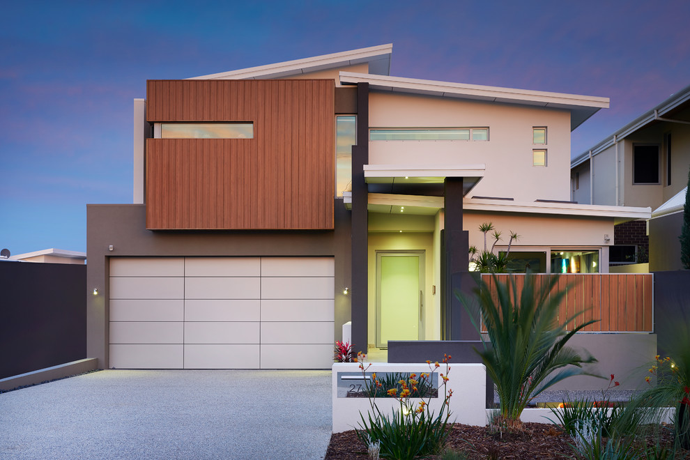 Contemporary two-storey beige house exterior in Perth with a shed roof.