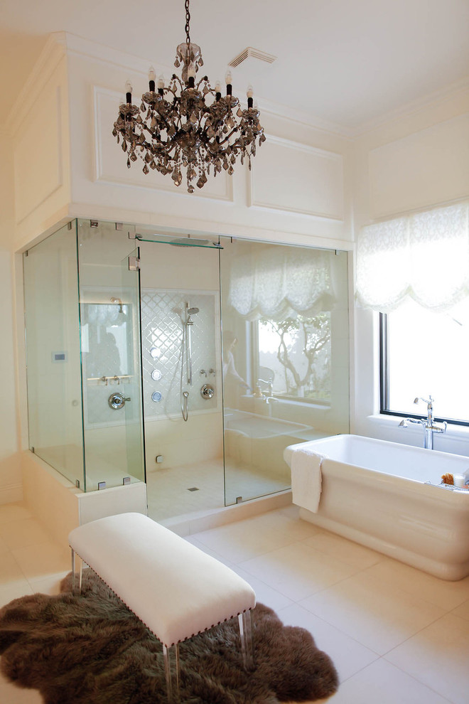 Freestanding bathtub - huge transitional master limestone floor freestanding bathtub idea in Phoenix with white walls